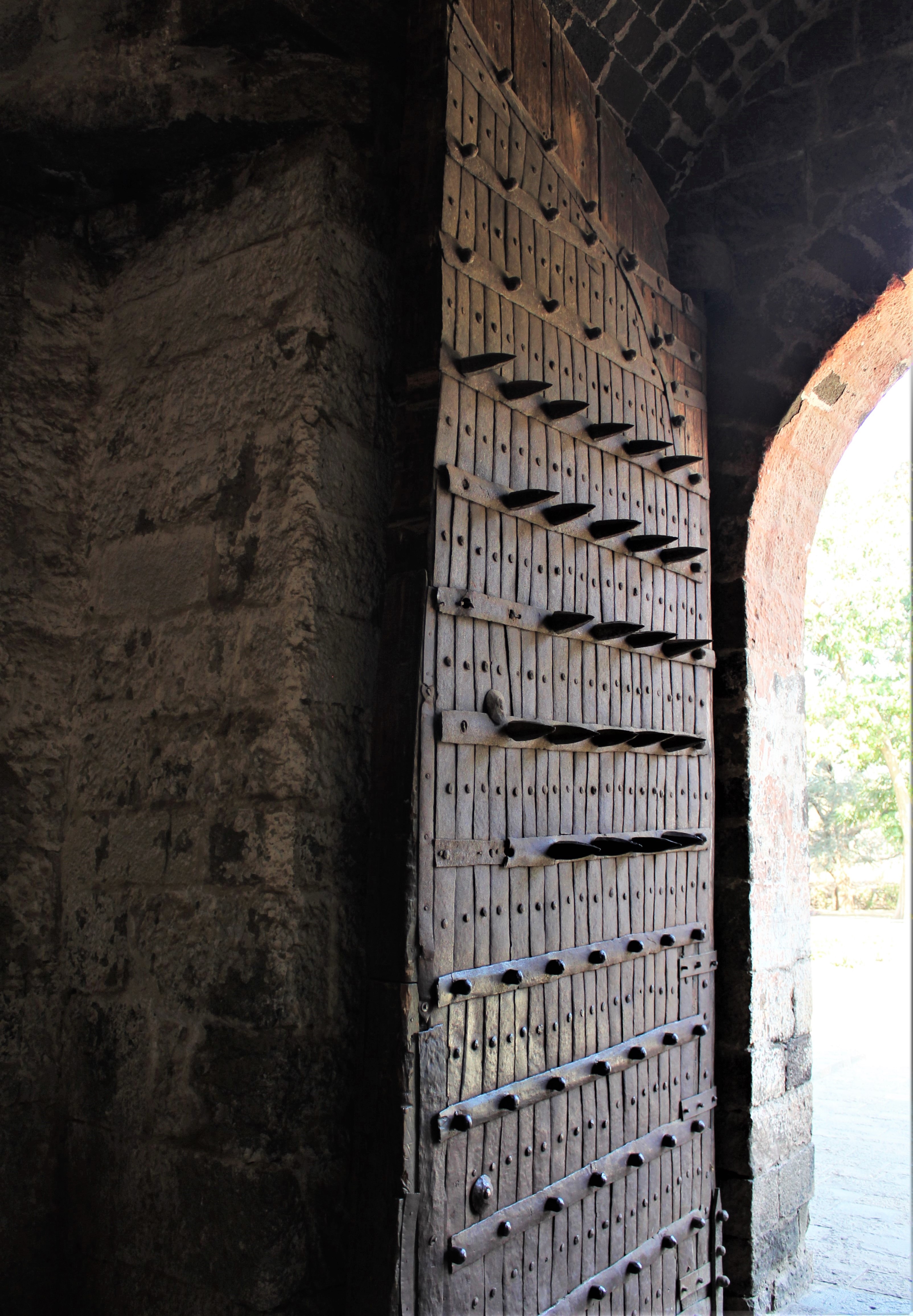 A Lofty Gate with Iron Spikes