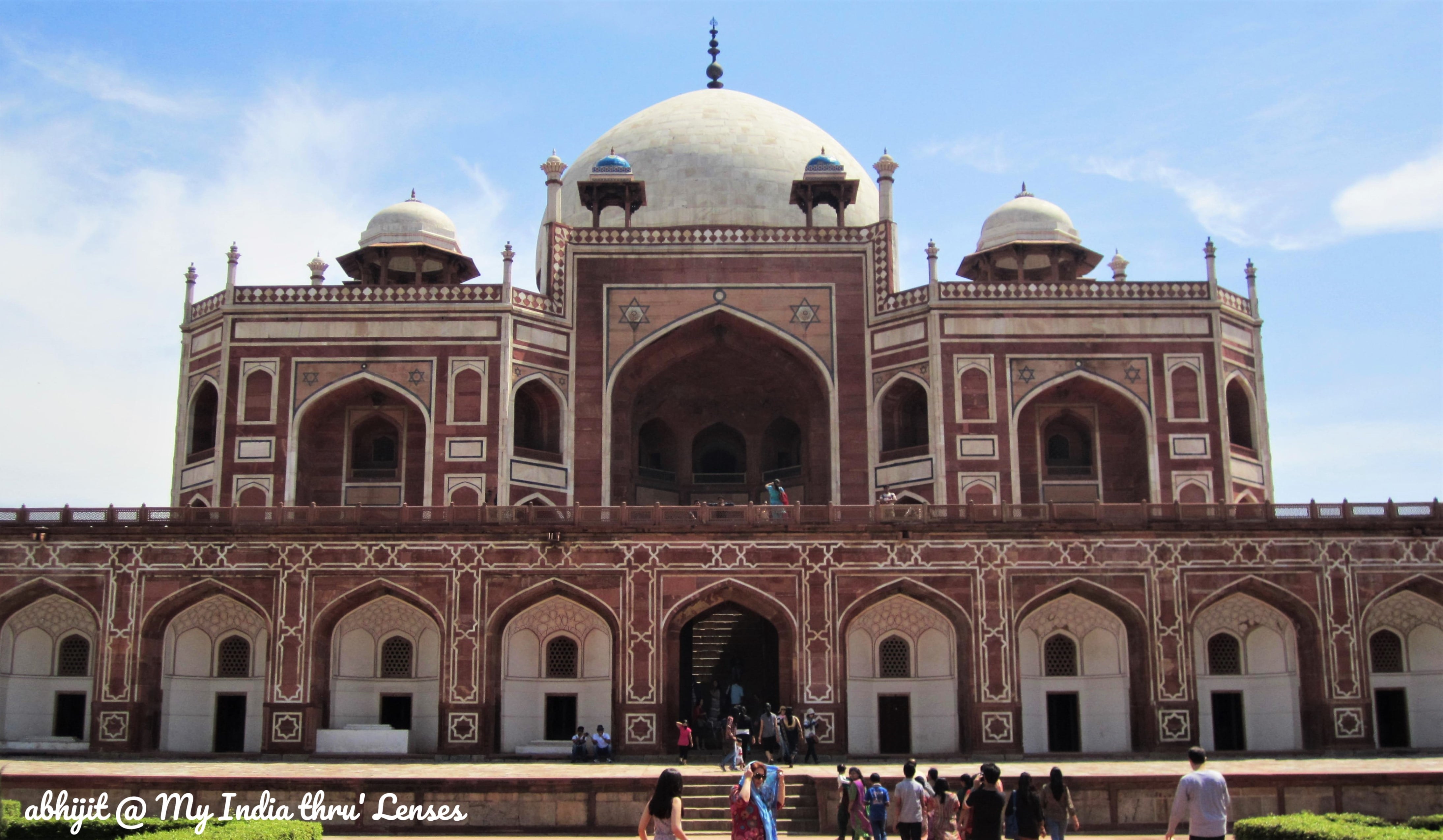 The plinth studded with arched alcoves. Each side has a staircase at the centre that opens up to the terrace.